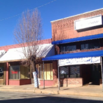 These small town neighbors bought vacant buildings, brought them up to code. Here’s what happened next